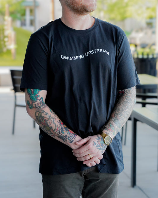 Swimming Upstream Wavy Adult Tee